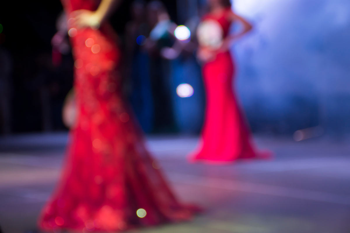 Unrecognizable women in beauty contest concept